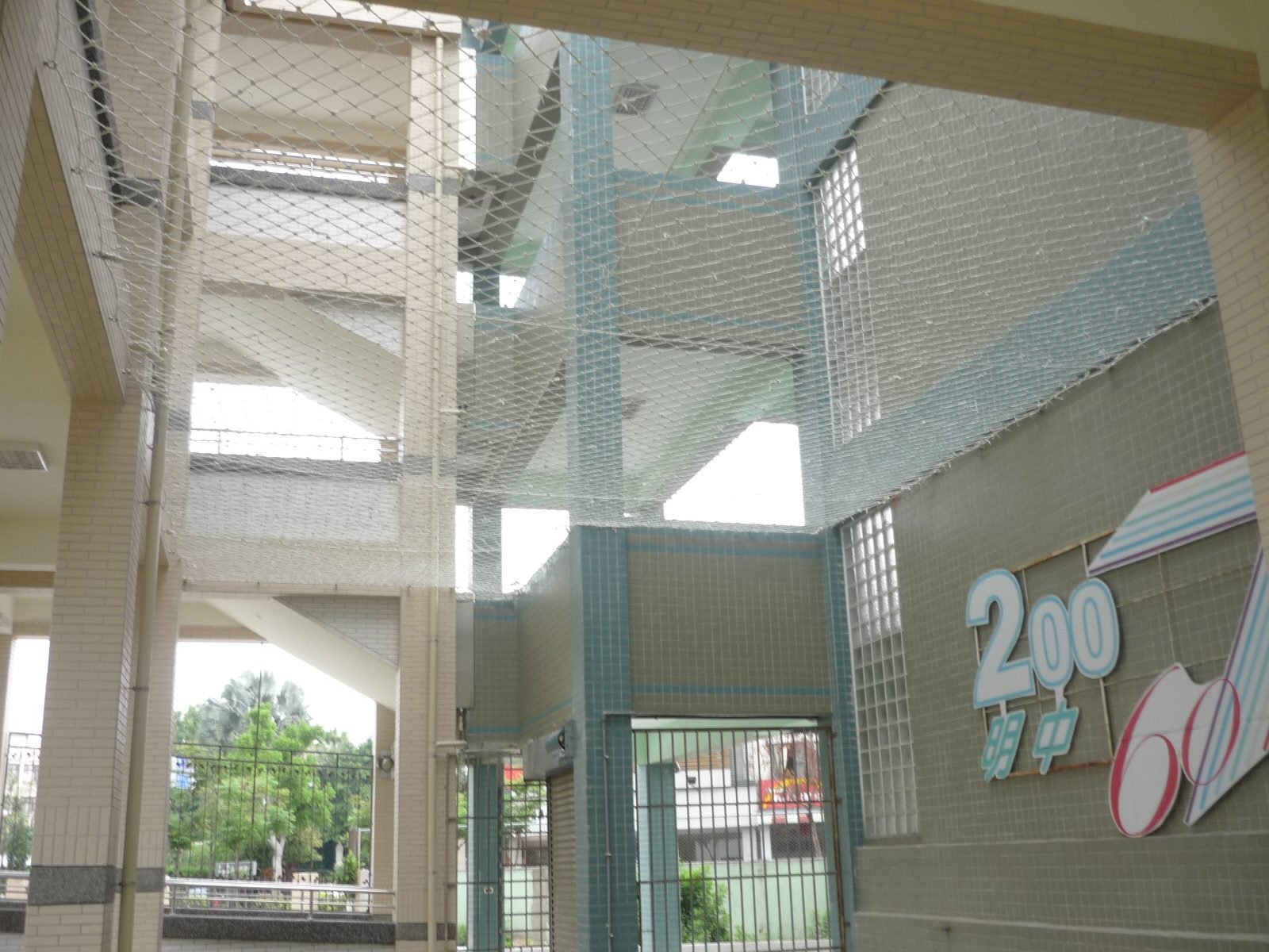 Netting over a school courtyard light well