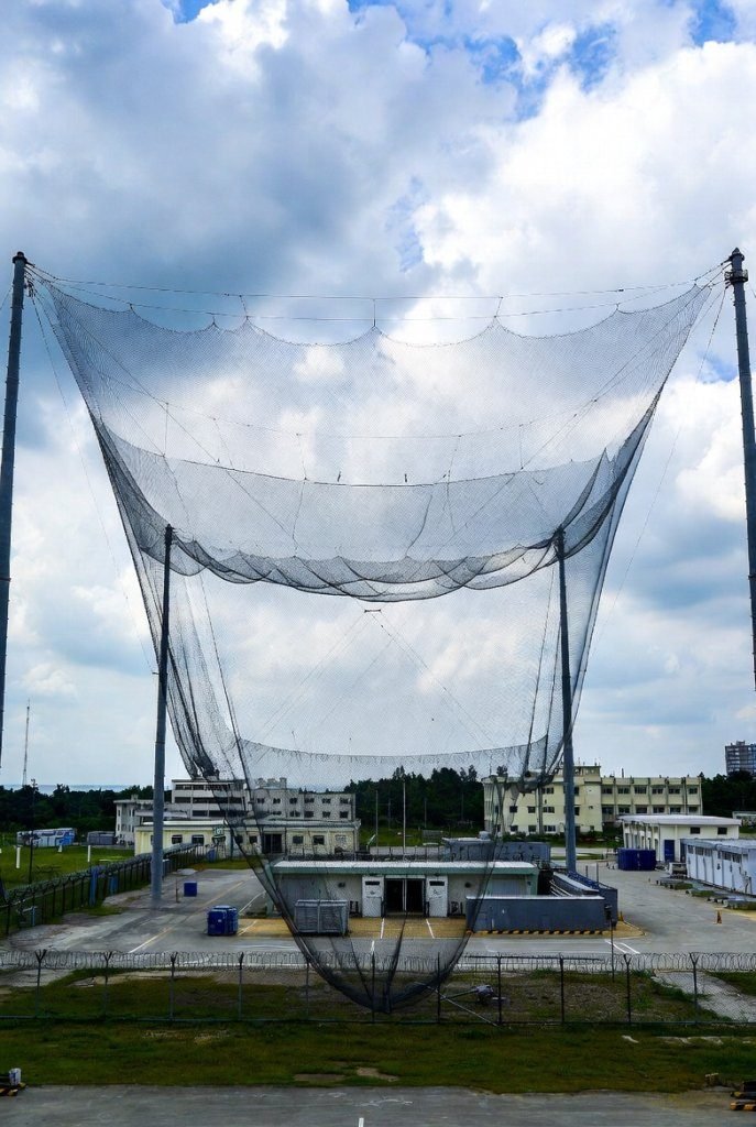 Bird netting in an aircraft hangar